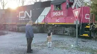 train honking and waving to Easton