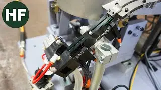 Automotive Clip Orientation System | Vibratory Feeder with Robot Integration