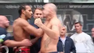 STEPHEN SIMMONS LEANS IN WITH HEAD, WADI CAMACHO SHOVES HIM BY THE THROAT @ AGGRESSIVE WEIGH IN