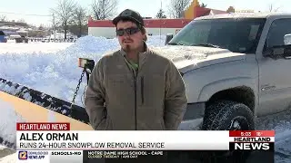 Snow removal crews working long hours to remove snow from private lots