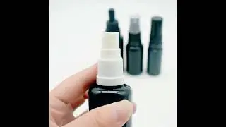 European flat shoulder black essential oil bottle