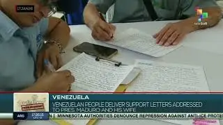 Venezuela | Venezuelan people deliver support letters addressed to pres. Maduro and his wife