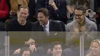 Henrik Lundqvist Caught On Kiss Cam With Alaxander Skarsgard and Ryan Reynolds.