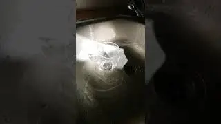 Amazing slow motion video ... Water flow on the glass