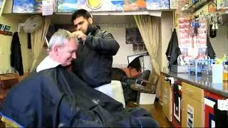 Haircut in Caldmore (2011) / Martin Parr