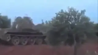 Syrian army Anti Tank missile scores direct hit on stolen FSA Tank