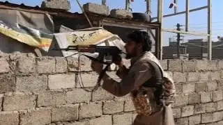 Raw: Militants, Iraqi Troops Fight for Mosul
