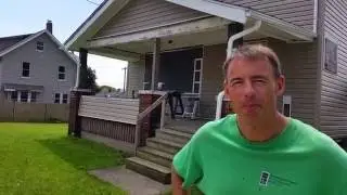 Artistic board-ups of vacant homes