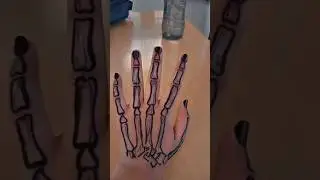 skeleton hand tattoo on hand with pen #art #tattoo #skeleton #penart #blackpen