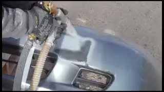 Media Blasting a Car's Plastic Bumper with Crushed Glass