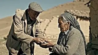Elderly couple holding hands, warm light, cinematic portrait.