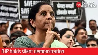 BJP holds silent demonstration to protest clashes at Amit Shah's roadshow