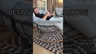 Grand patio, indoor outdoor rocking chair with a steel metal base, a water resistant comfy cushion
