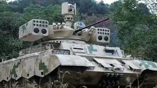 QN-506 multi-weapon tracked armored vehicle based on Type 59 MBT - News Military Update _ NMU