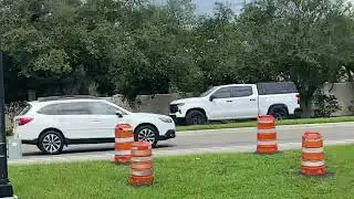 A Sarasota County undercover police pick up truck responding.