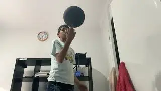 Spinning a basketball on finger for over 3 minutes! (Personal record).
