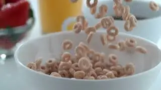 cereal being poured into a bowl   Stock Video Footage