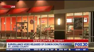 Surveillance video shows armed robbery at Dunkin' Donuts on County Road 210