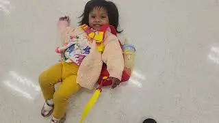 Izzie fighting the baby leash