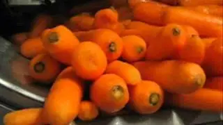 Haith Root Veg Peeler-Polisher on Carrots with patented roller design.wmv