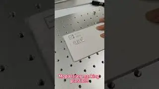 MOPA laser marking machine precisely marks on plastic materials.