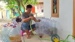 Pembersihan wadah galon tanpa mengeluarkan lelenya