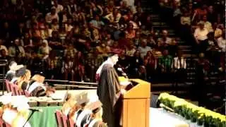 Board of Education Trustee Kevin Beiser accepts the Patrick Henry High School Class of 2012