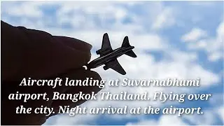 Aircraft landing at Suvarnabhumi airport, Bangkok Thailand. Flying over the city. Night arrival