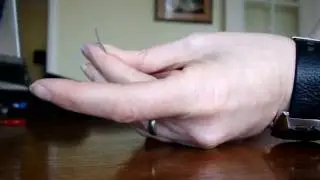 How to thread a cross stitch needle using a threader