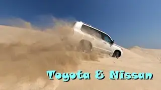 Toyota Land Cruiser & Nissan Xterra in Dunes in the Qatar Desert Inland Sea