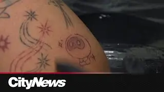 Members of the BTS Army show their support of the K-pop supergroup with Tattoos