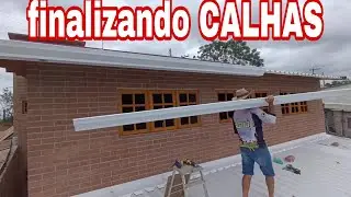 os detalhes do acabamento do telhado, calhas e rufo
