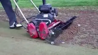 Toro Greensmaster 1000 using Nordic Plow