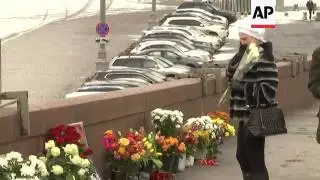 Floral tributes mark first anniversary of death