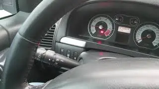 Jak aktywować automatyczne światła w Renault Laguna II po lifcie.