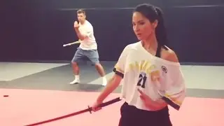 Aaron Rodgers Sword Fighting with Olivia Munn
