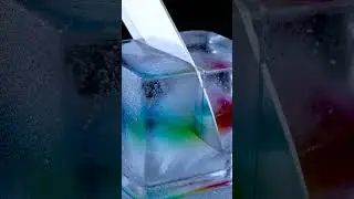 Knife cutting through a frozen block with colored liquid waves inside #ekmotahathighumechala