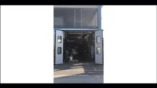 Portone industriale a libro Aprico | Motorizzato con aperture ante a 180 gradi | Apertura tutto vano