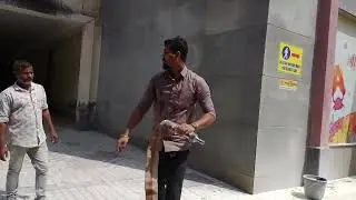 October 27, 2025 fire brigade ka Jawan Aag bujhane ki training deta hua