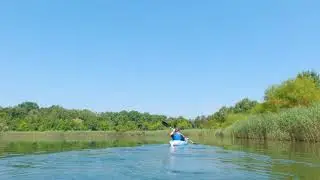 Paddling/kayaking on Falls Township Community Park Lake, July 2021