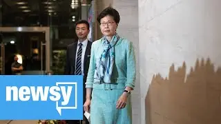 Carrie Lam abandons speech after protests