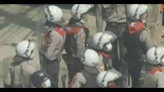 Myanmar police use tear gas to disperse protests