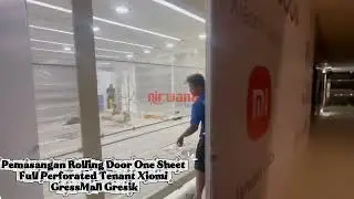 Pemasangan Rolling Door One Sheet Full Perforated untuk tenant Xiaomi di Gressmall Gresik 