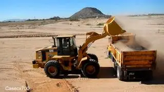 Самосвал CAT 938G Loading Autocar