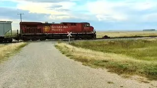 Eastbound CP 9777 Prepares To Stop For Rail Road Expansion And Repairs Near Rush Lake, SK