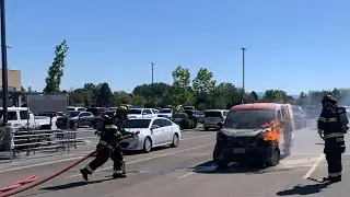Firefighters extinguish vehicle in flames at Albertsons in Star