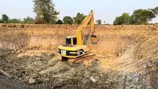 Caterpillar  Loading Overburden at Massive Mining Site - Sotiriadis Mining Works