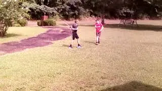 masked YouTuber doing a sword fight with Gavin maughon