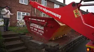 Delivering a 6 Yard Skip over a small wall in Bristol