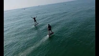 FPV Drone Chases E-Foil Riders | Smooth Coastal Flight in 4K